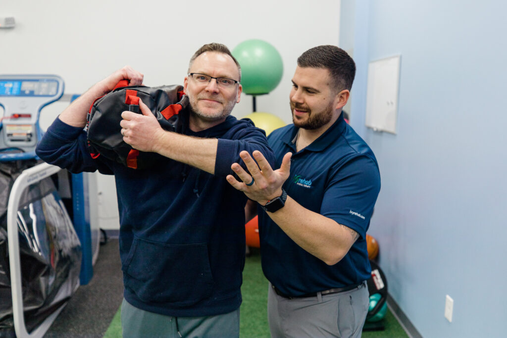Workers' compensation physical therapy focused on restoring shoulder strength and functional movement