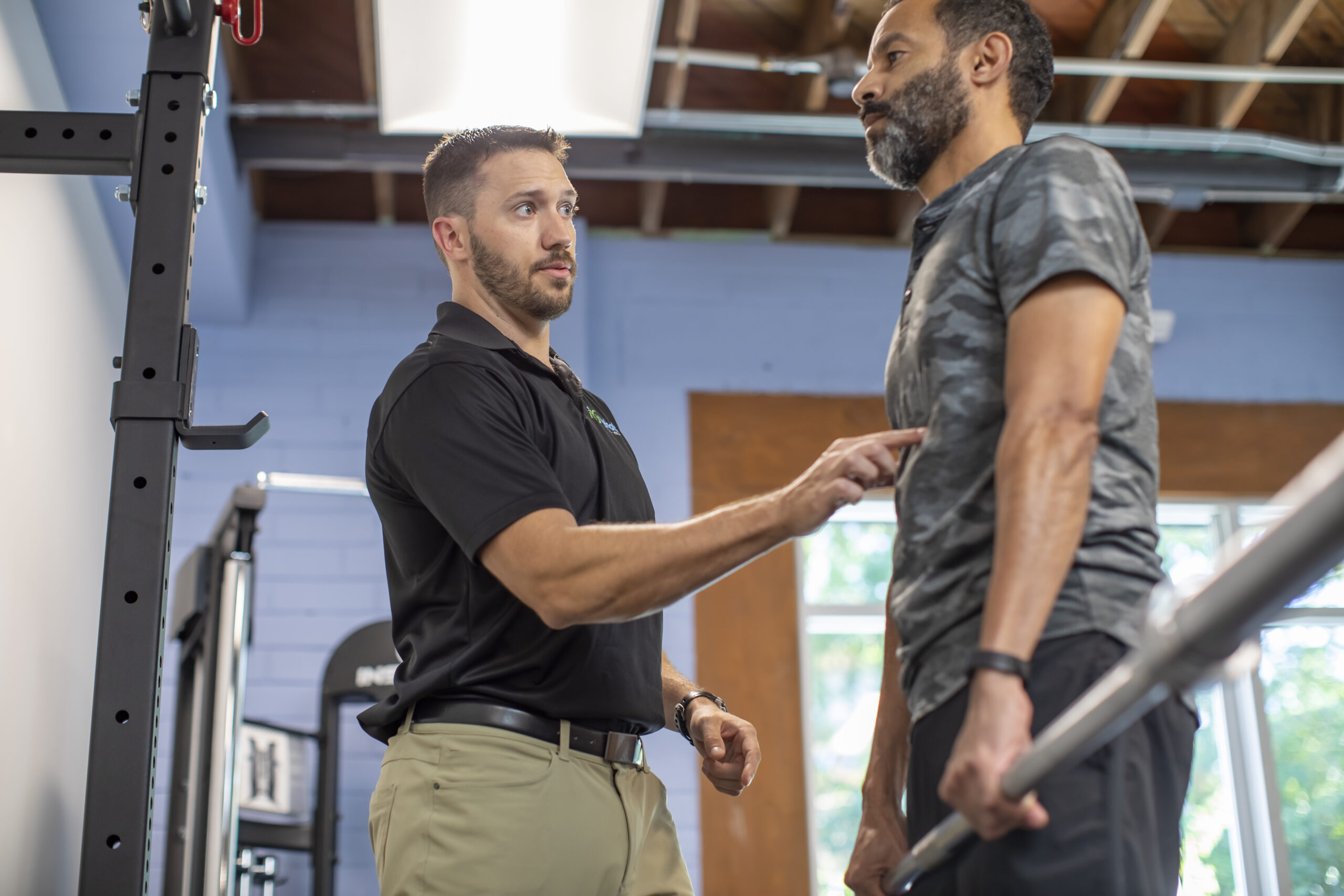 Physical therapist conducting post-offer employment testing to evaluate job-related strength and mobility